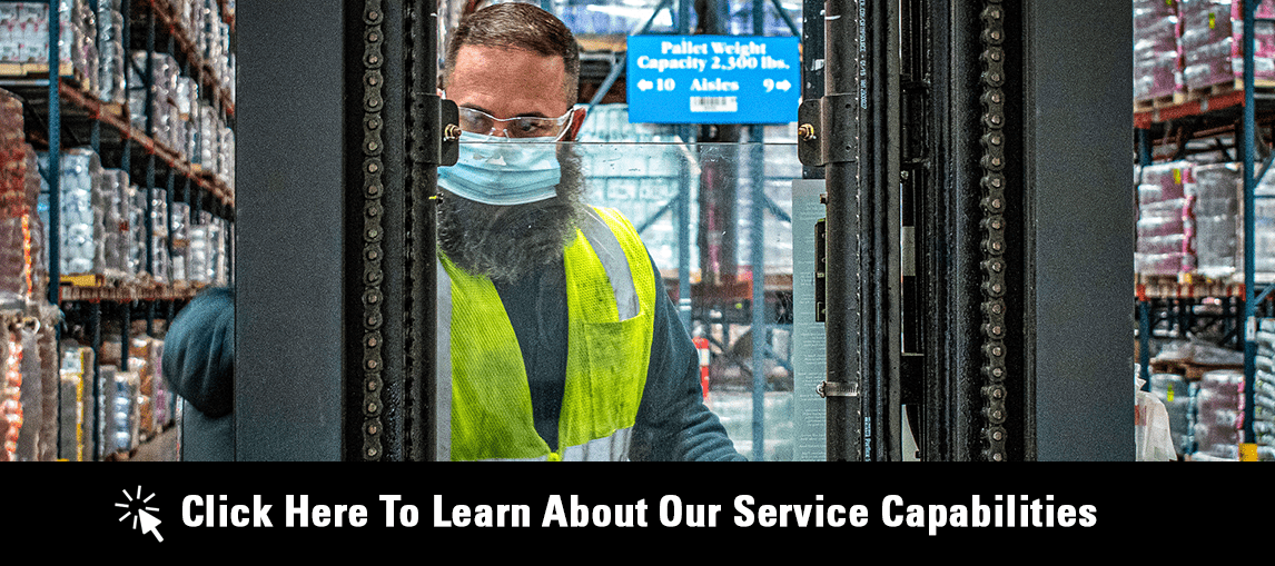Click Here to Learn About Our Service Capabilities. Service technician performing maintenance on forklift.