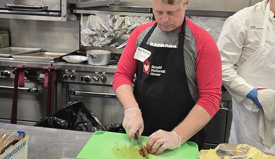 RSC employee preps lunch at Ronald McDonald House.