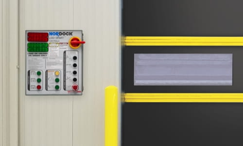 Warehouse dock area with dock control panel on the wall