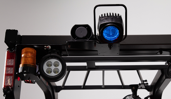 Close up of a forklift overhead showcasing various light options like a blue light and warning light.