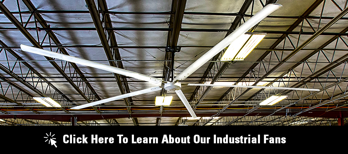 Click Here to Learn About Our Industrial Fans. Warehouse ceiling with large industrial fan.