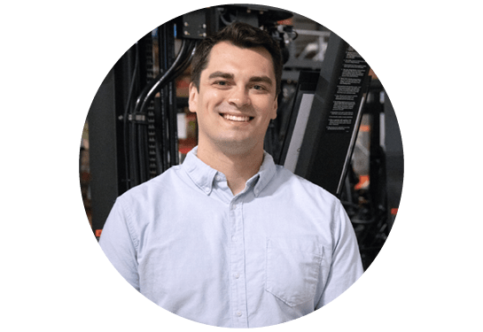 Profile picture of Scott Schloss, RSC Director, National Accounts. In a blue suit with plaid tie on gray patterned background.