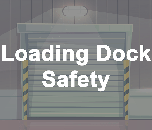Loading Dock Safety. A warehouse dock door with safety bollards.
