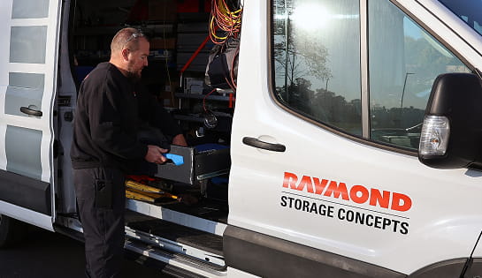 RSC technician pulling his tools out of an RSC service van.